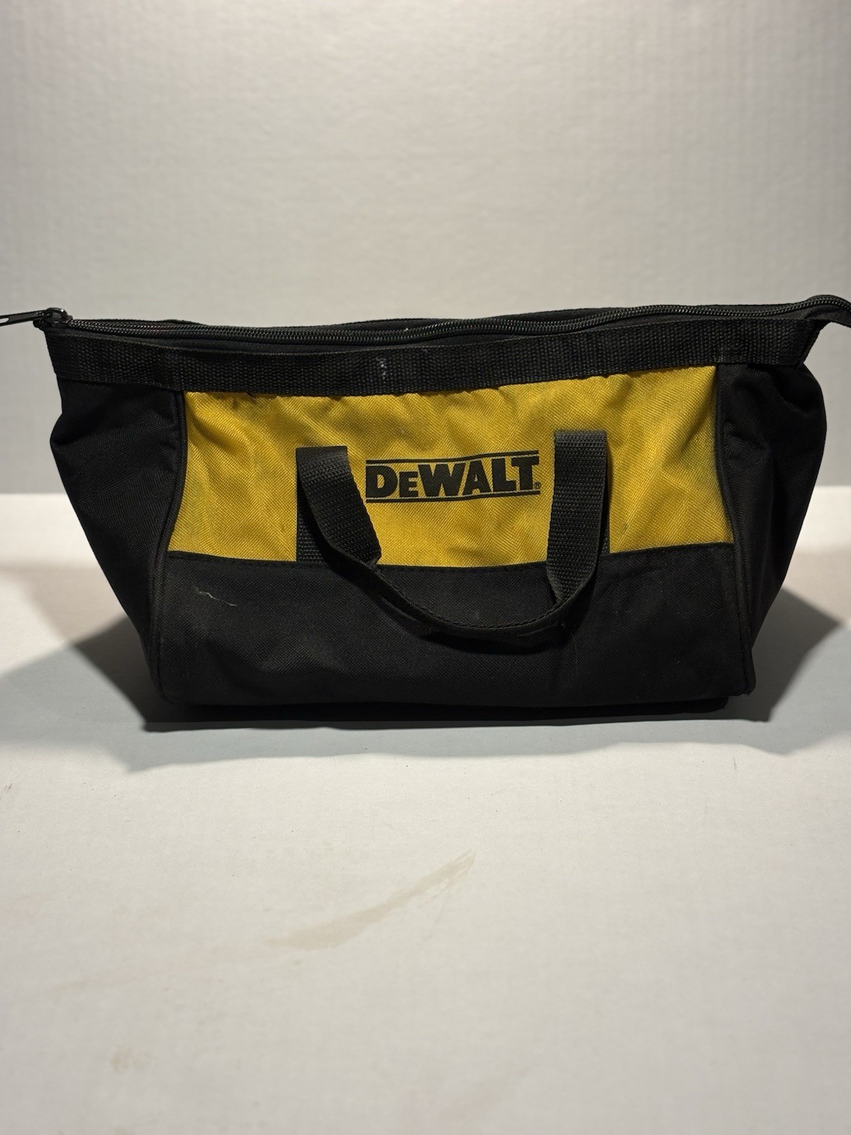 DEWALT Black and Yellow Fabric Tool Bag with Handles and Zipper Closure USED