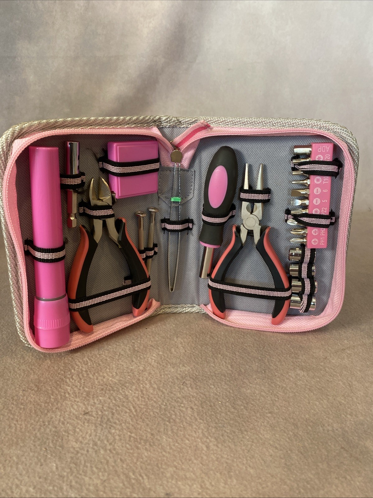 Tool Set housed in a pink canvas zippered case