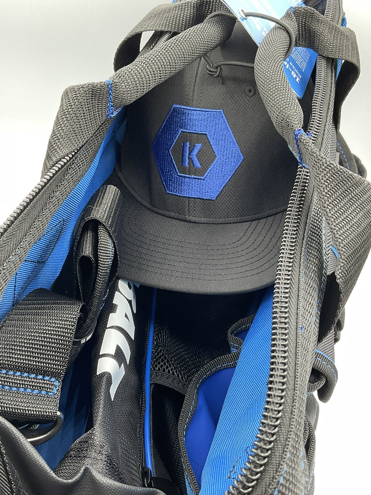 Kobalt 16” Cargo/Tool Bag Includes Drawstring Backpack And Adjustable Cap – New