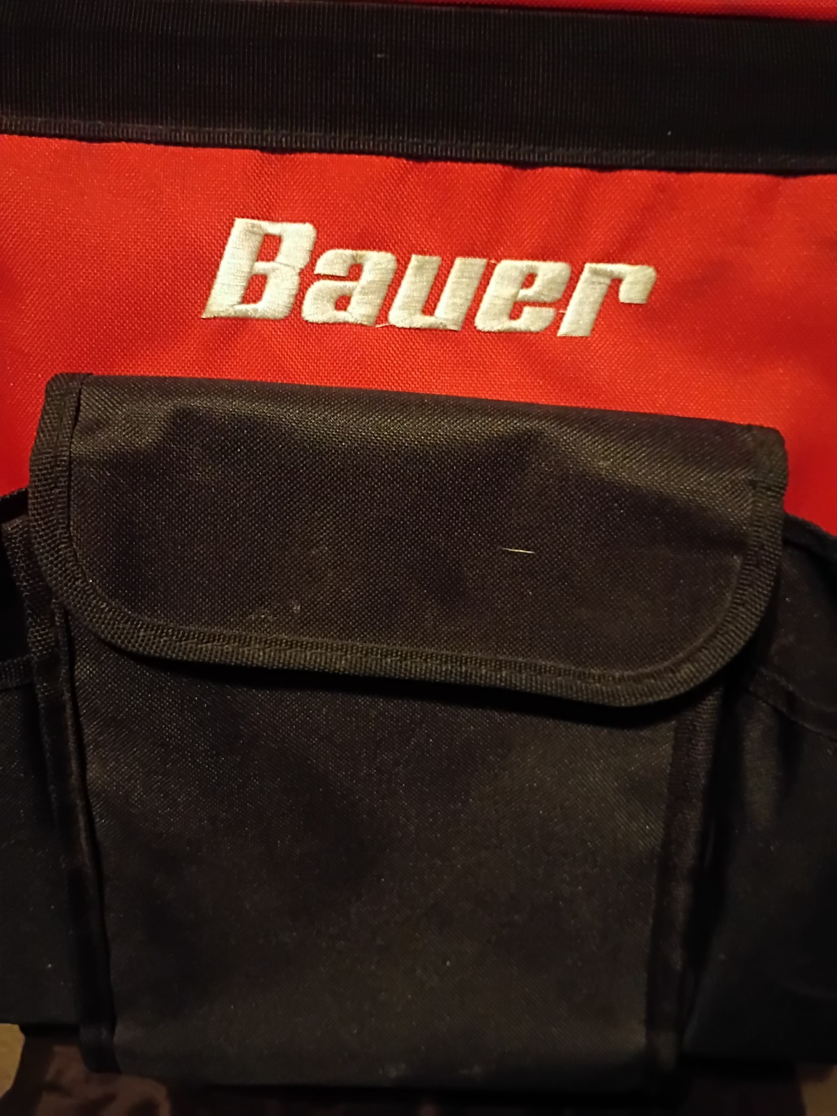 Bauer 18-inch roller tool bag, model SKU 64663, featuring red and Black